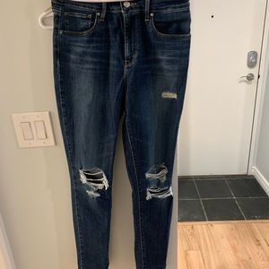 Levi’s 721 dark blue with distressing
